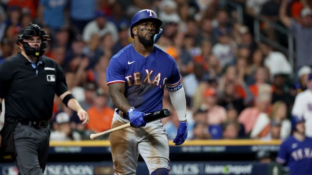 Oct 23, 2023; Houston, Texas, USA; Texas Rangers right fielder Adolis Garcia (53) reacts after hitting a home run during the third inning of game seven in the ALCS against the Houston Astros for the 2023 MLB playoffs at Minute Maid Park. Mandatory Credit: Thomas Shea-USA TODAY Sports